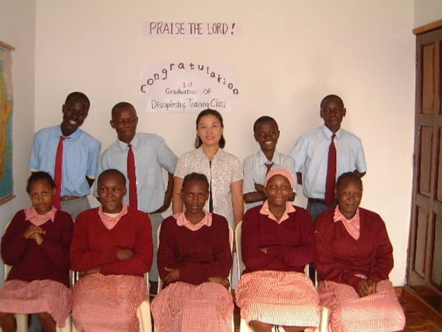 Missionary Hong teaching children